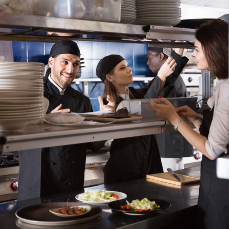 Waitress and cook communicating