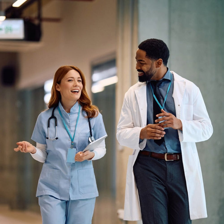 Doctor and nurse walking while talking