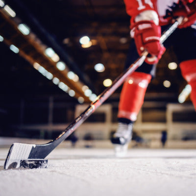 Image showing a hockey player with a hockey stick and puck